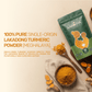Aarogya single-origin Lakadong turmeric powder banner featuring a green pouch, raw turmeric roots, and a wooden bowl.