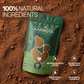 Green pouch of 100% natural Aarogya Nutrimix Date Seed Coffee Powder placed on finely ground roasted date seeds, free from added preservatives