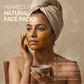 A woman applying a DIY face pack made from Aarogya high curcumin turmeric, raw honey, and lemon for natural skincare.