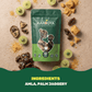 Aarogya Nutri Mix amla candy pouch surrounded by raw ingredients including fresh gooseberries and chunks of palm jaggery.