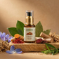 Aarogya Nutri Mix Kumkumadi Thailam 30ml pump bottle with saffron, sandalwood, turmeric, manjistha and Ayurvedic herbs on stone