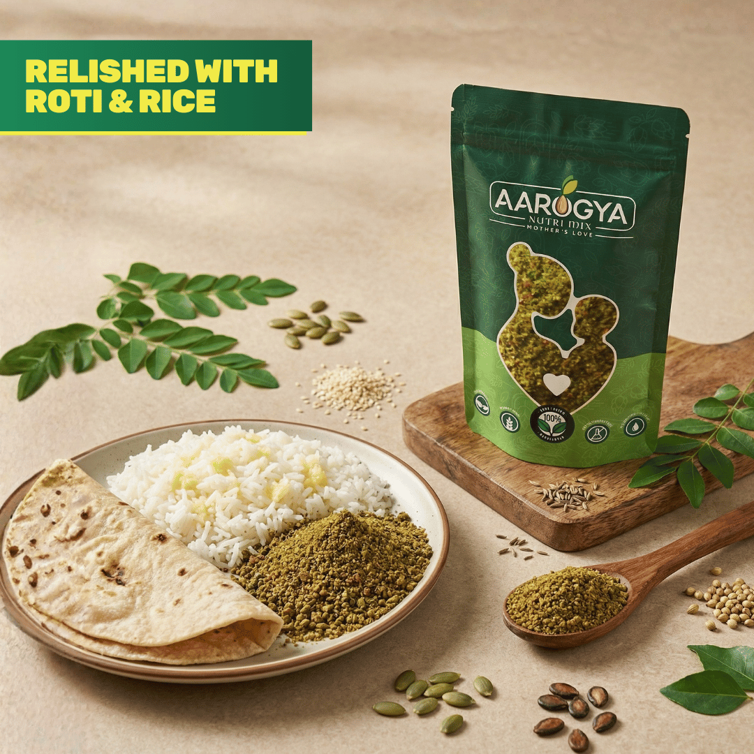 A meal setting showing Aarogya podi served alongside a handmade roti and white rice, surrounded by raw spices and seeds.