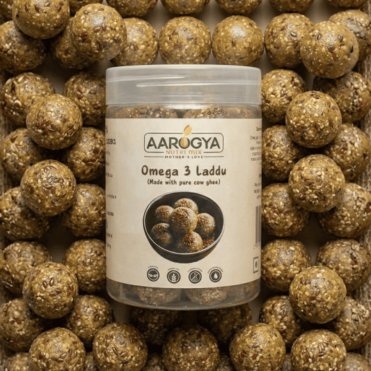 Aarogya Nutri Mix Omega 3 Laddu jar made with pure cow ghee surrounded by healthy flaxseed laddu sweets.