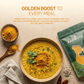 A steaming bowl of dal garnished with Aarogya single-origin turmeric powder, showing how to boost everyday meals naturally.