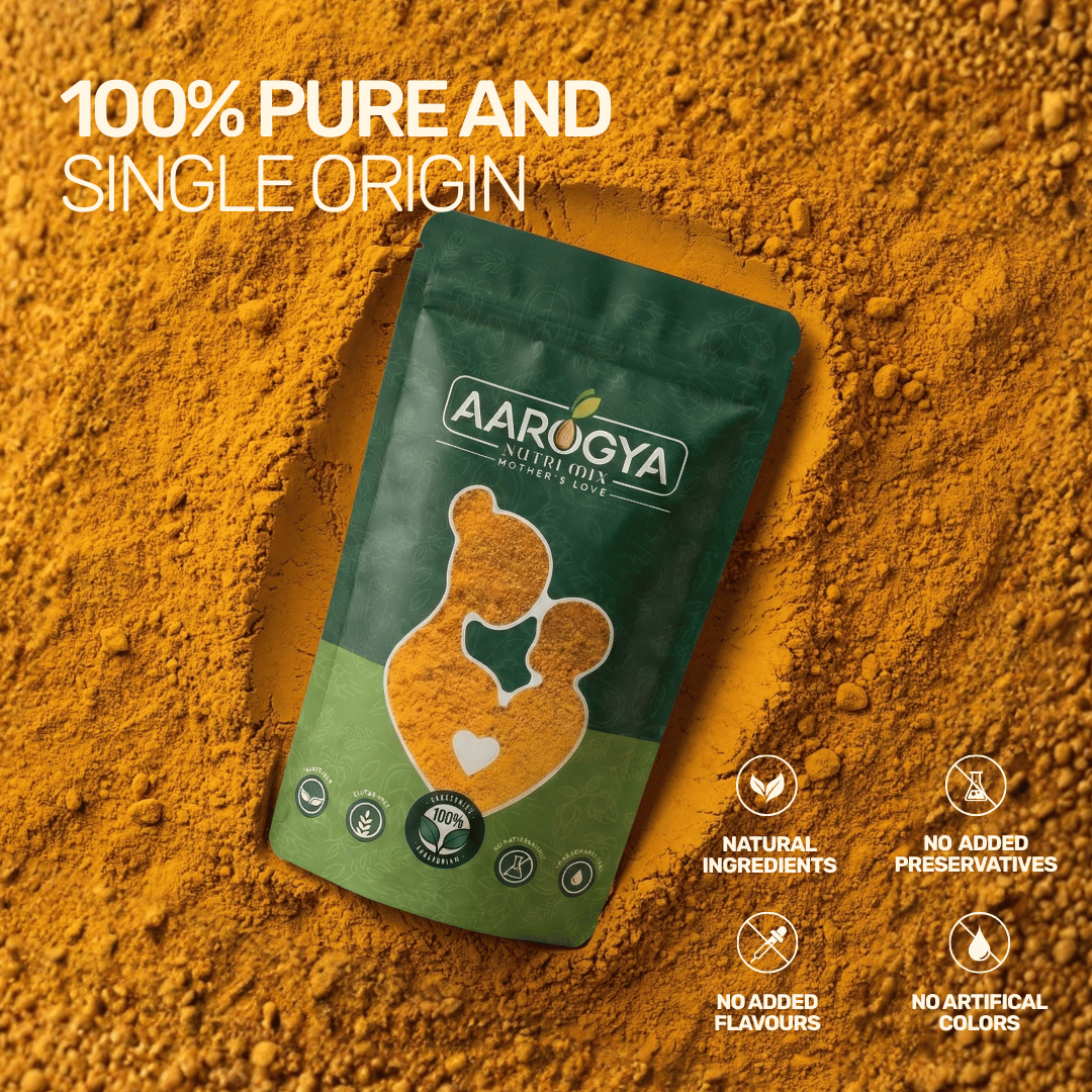Aarogya single origin turmeric powder pouch resting in a textured bed of pure, deep golden-yellow ground turmeric
