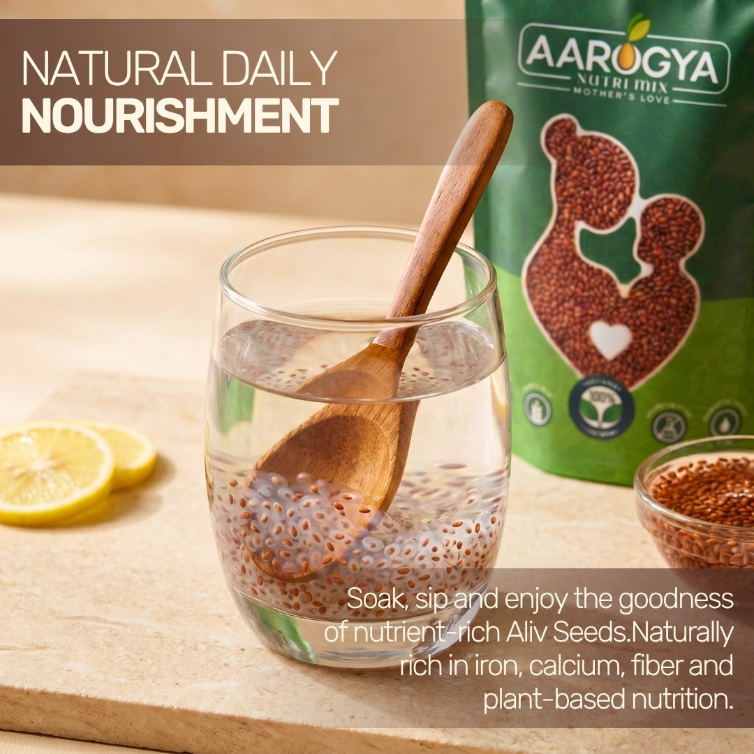 Soaked Aarogya Nutrimix Aliv seeds in a glass of water with a wooden spoon and lemon slices for daily nourishment