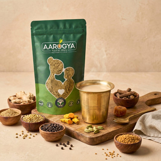 Aarogya Nutrimix Sukku Malli Coffee Powder placed next to a traditional brass cup of hot herbal dry ginger coffee.