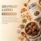 Aarogya weight gain porridge mix bowl surrounded by ingredients like nuts, seeds, and dates next to green packaging