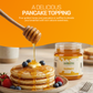 Delicious natural honey used as a sweet topping to elevate breakfast pancakes and waffles.