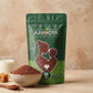 Aarogya Nutrimix Aliv Seeds stand-up pouch displayed next to a bowl of raw garden cress seeds, milk, and jaggery